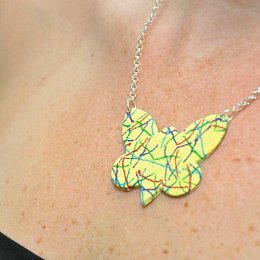 Žilkovaný motýl žlutý